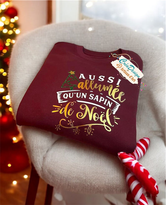 Sweat "Aussi allumée qu'un sapin de Noël"
